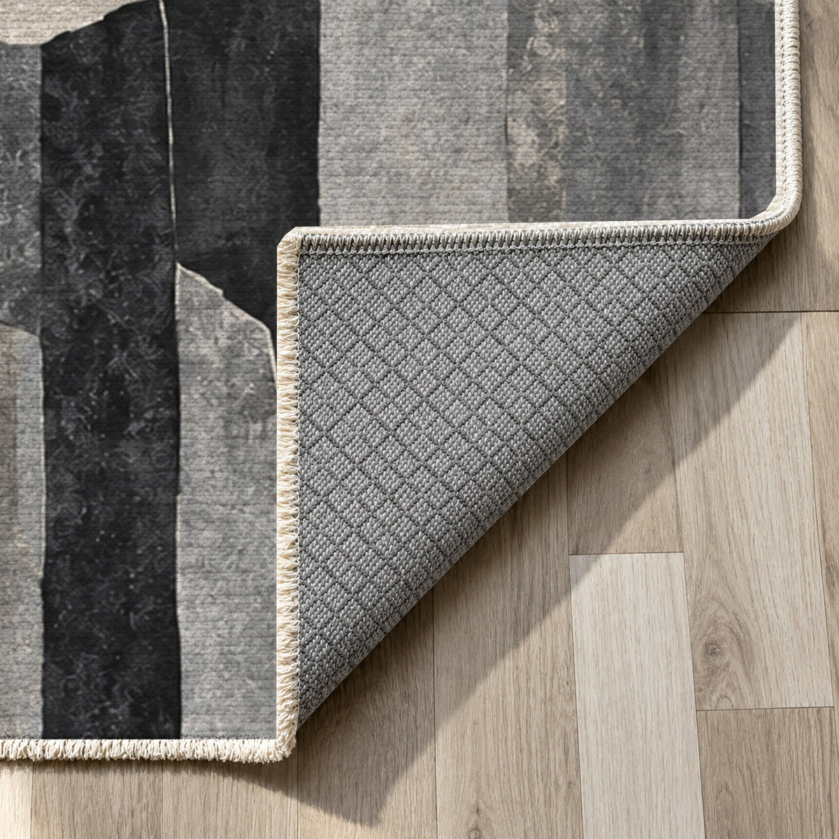 Basalt Columns Charcoal Abstract Washable Rug — backing close up