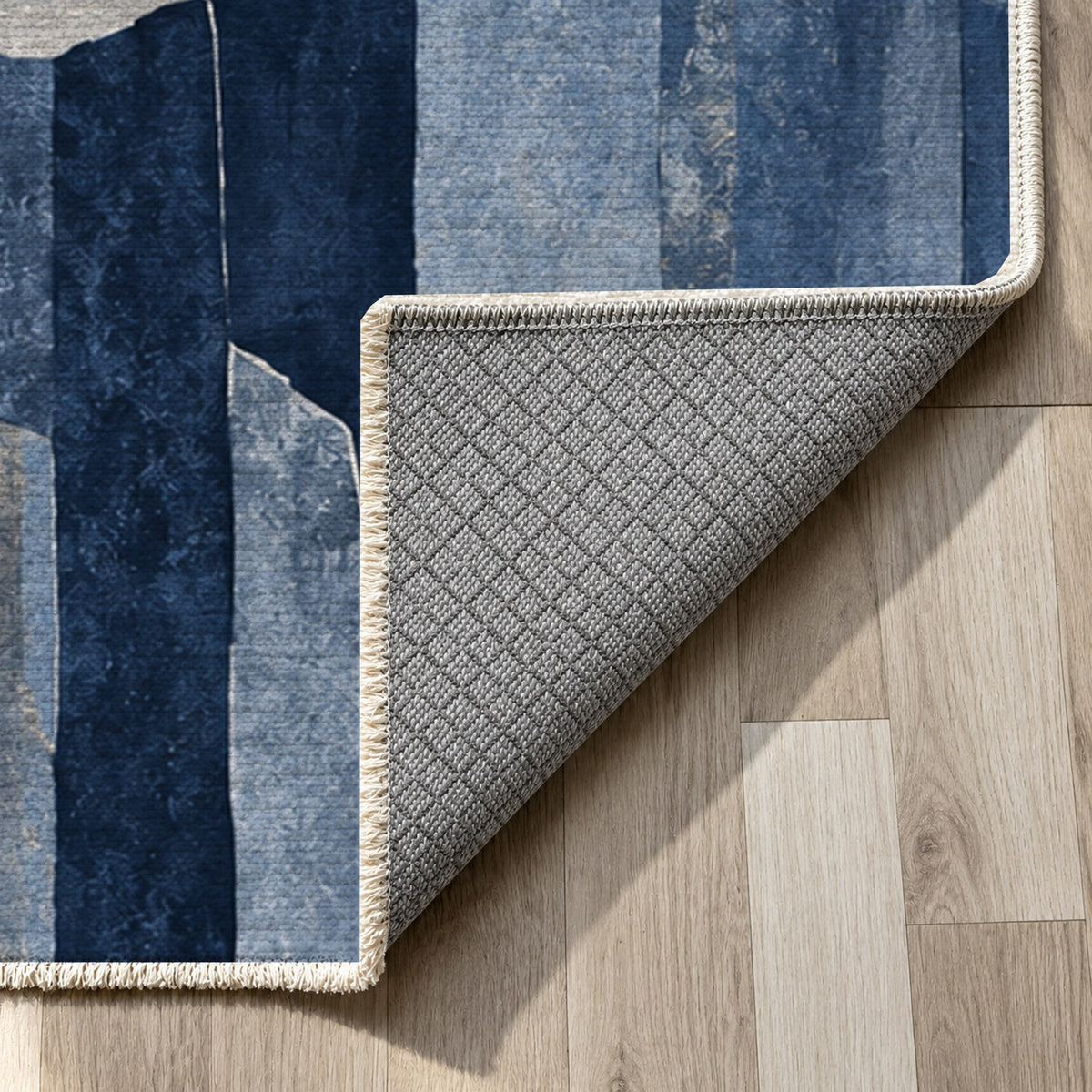 Basalt Columns Indigo Abstract Washable Rug — backing close up