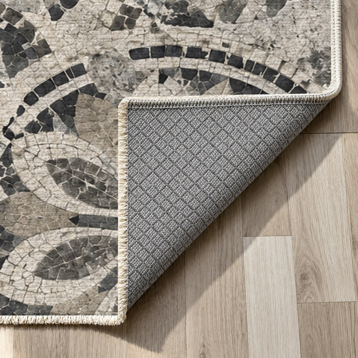 Broken Rosettes Charcoal Geometric Washable Rug — backing close up