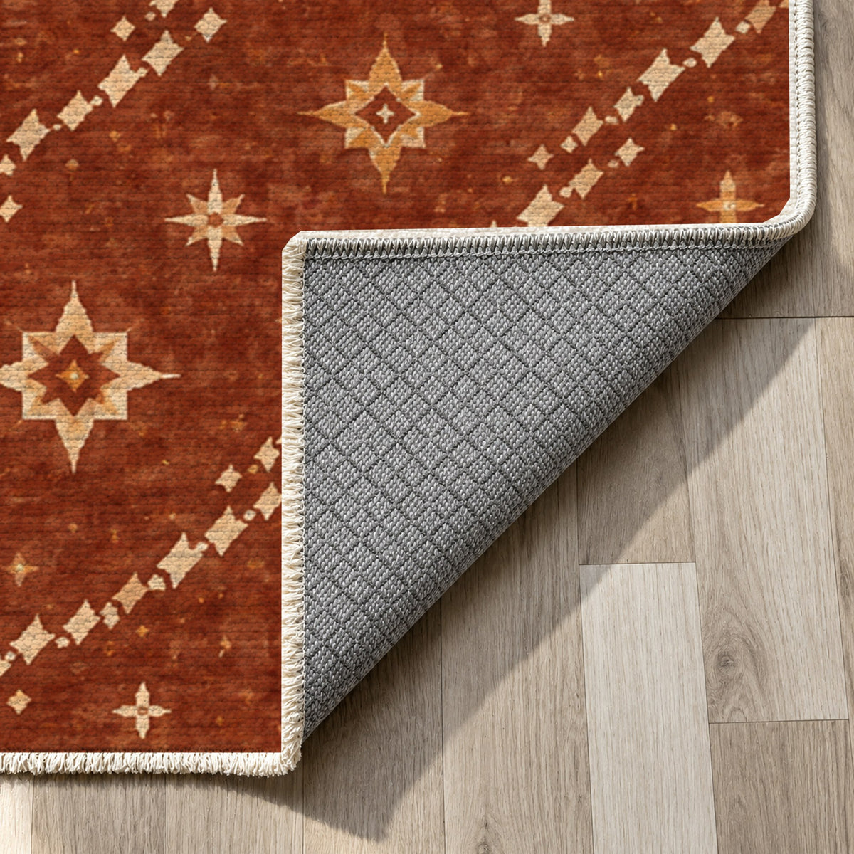 Caravan Stars Terracotta Ethnic Washable Rug — backing close up