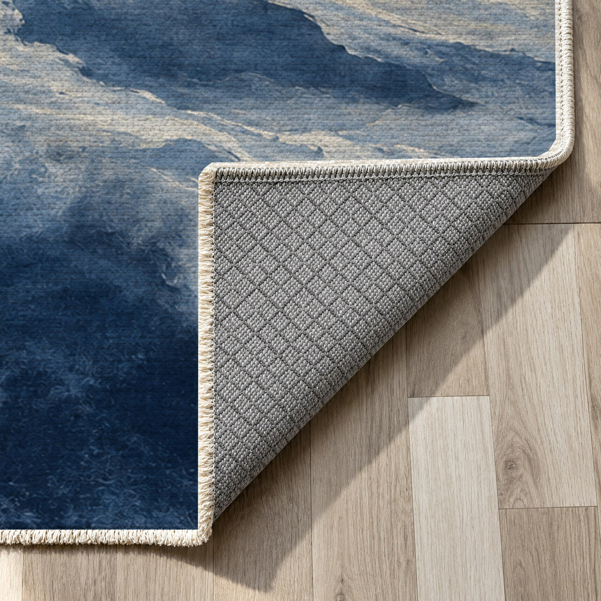 Cloud Atlas Indigo Abstract Washable Rug — backing close up
