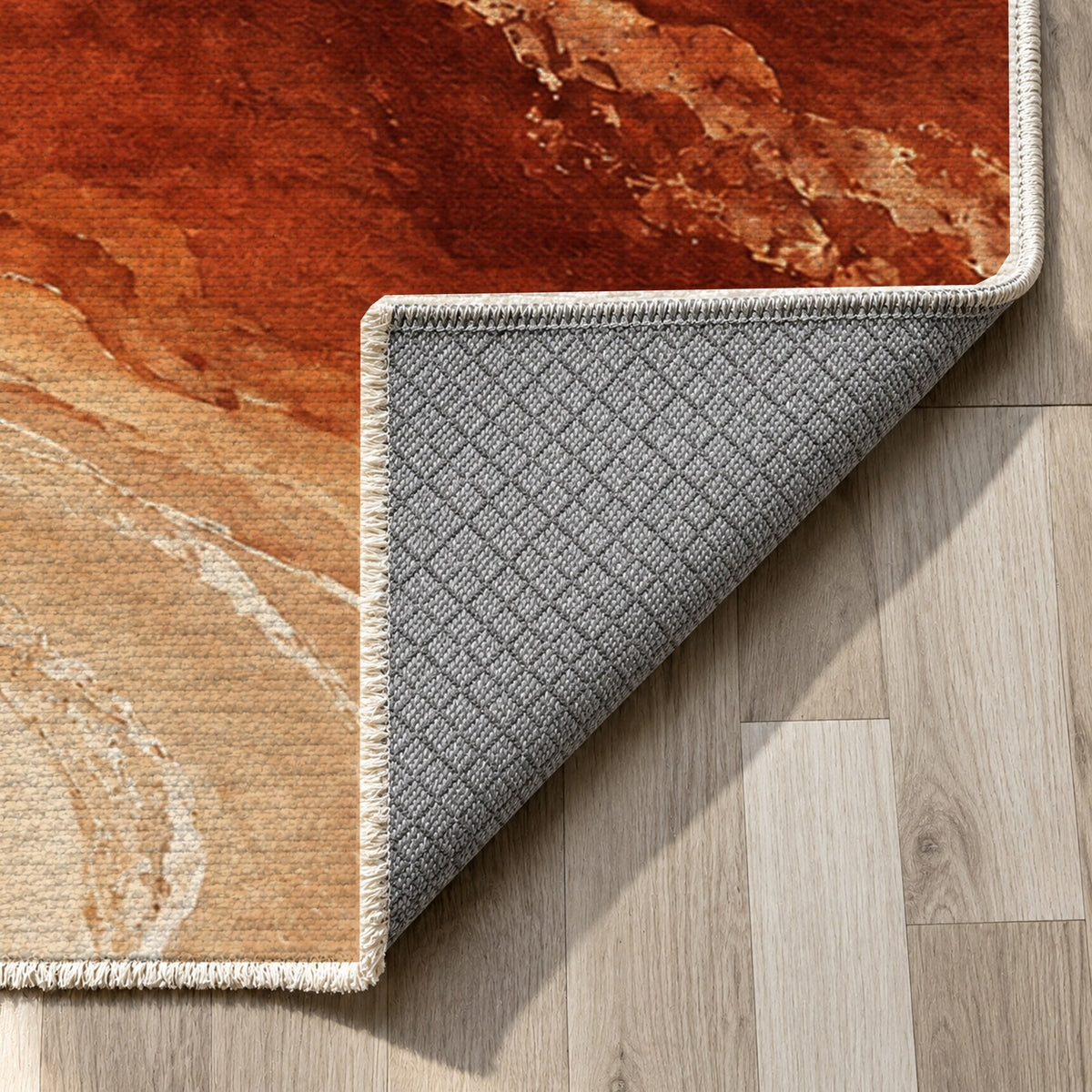 Coastal Contours Terracotta Abstract Washable Rug — backing close up