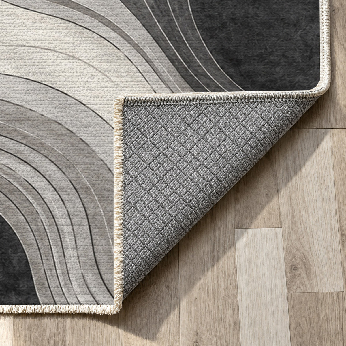 Contour Flow Charcoal Ivory Modern Washable Rug — backing close up