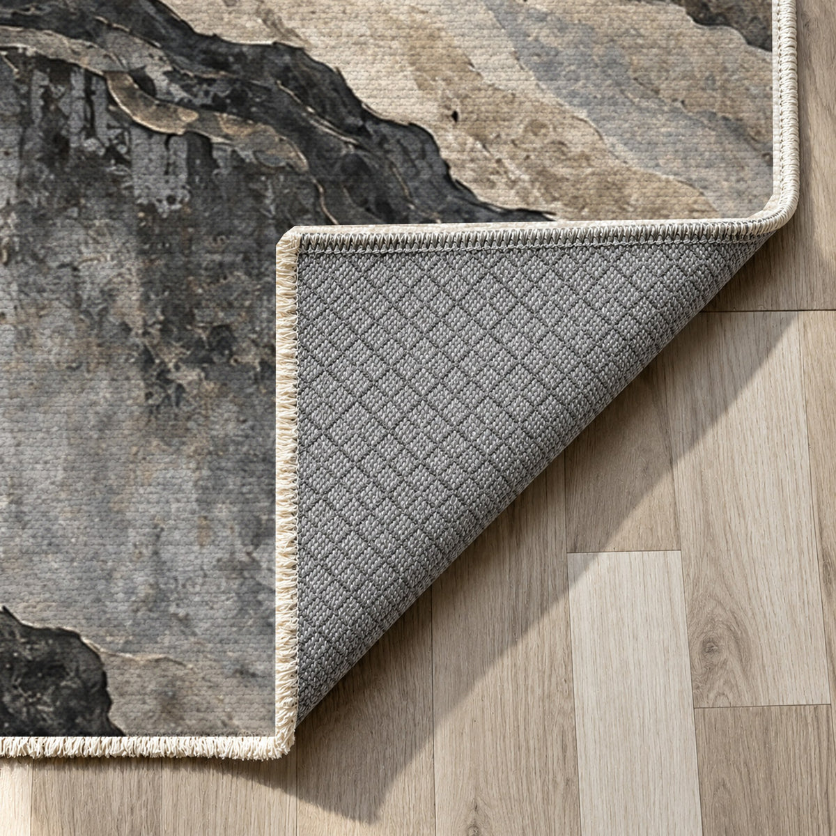 Copper Canyon Charcoal Abstract Washable Rug — backing close up