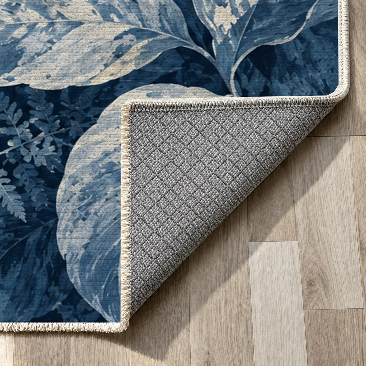Dappled Canopy Indigo Floral Washable Rug — backing close up
