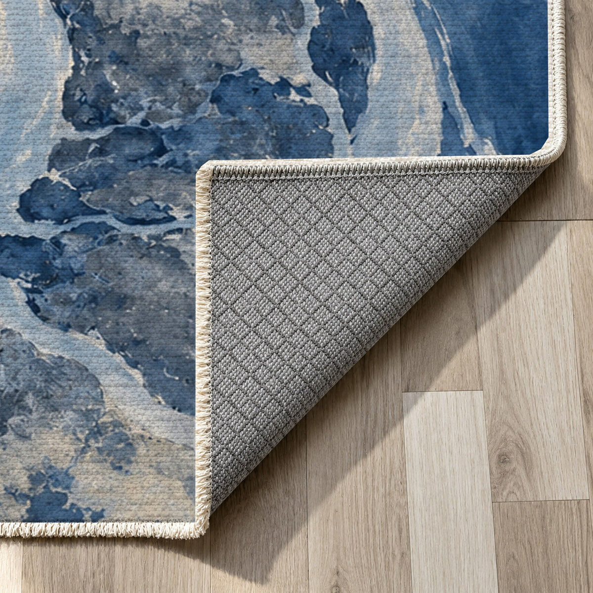 Delta At Dawn Indigo Abstract Washable Rug — backing close up