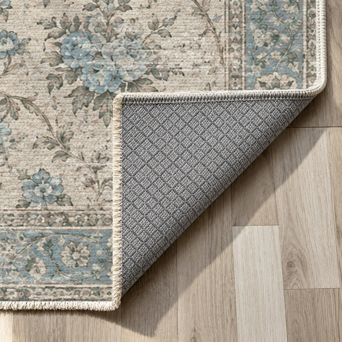 Faded Bouquet Turquoise Blue Vintage Washable Rug — backing close up