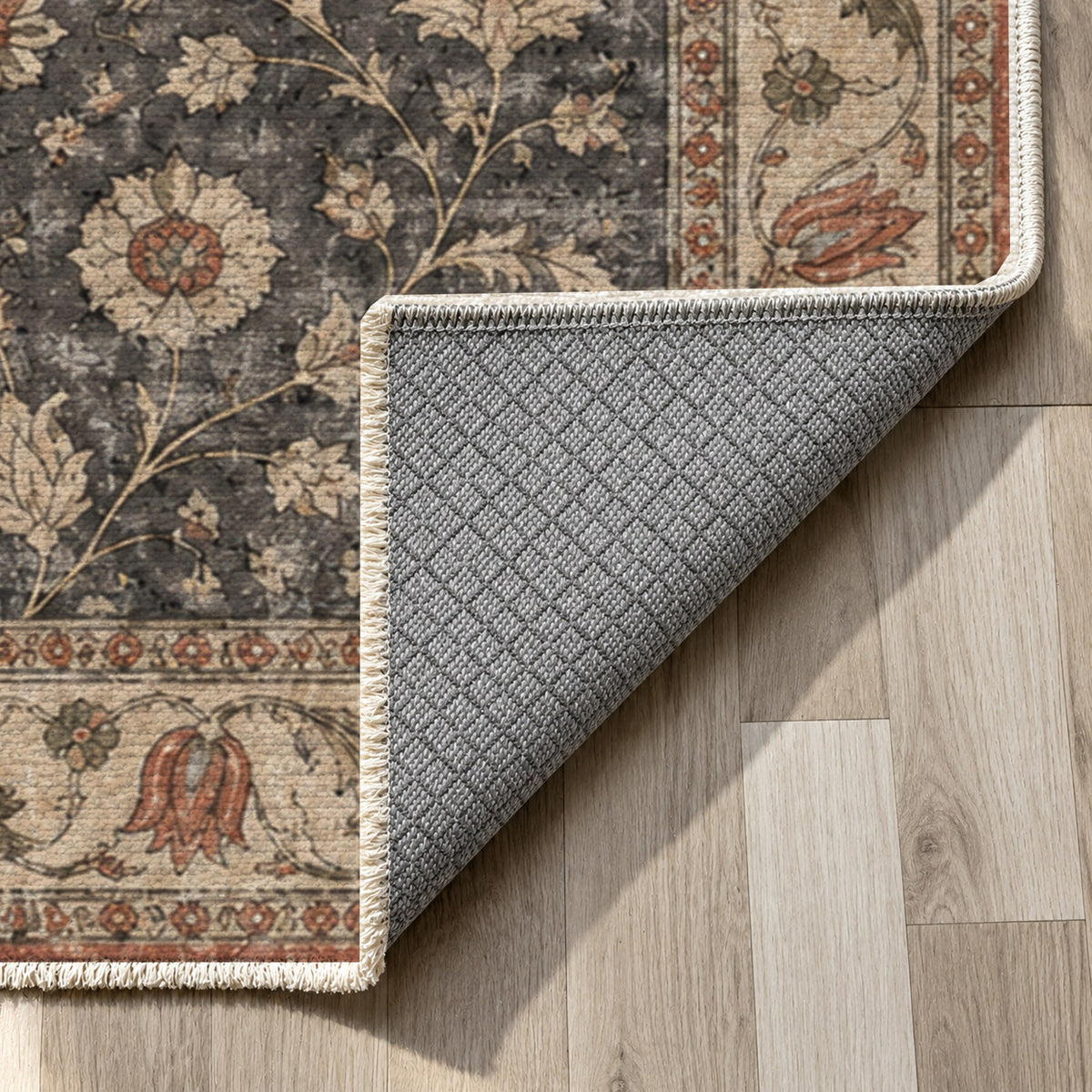 Faded Floral Black Vintage Washable Rug — backing close up