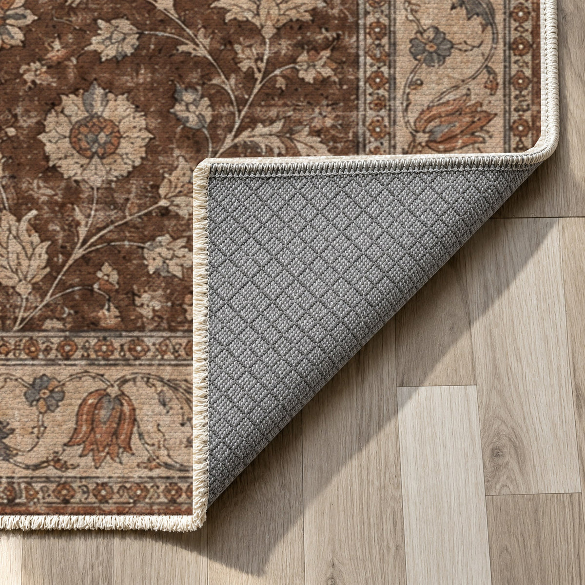 Faded Floral Chocolate Brown Vintage Washable Rug — backing close up