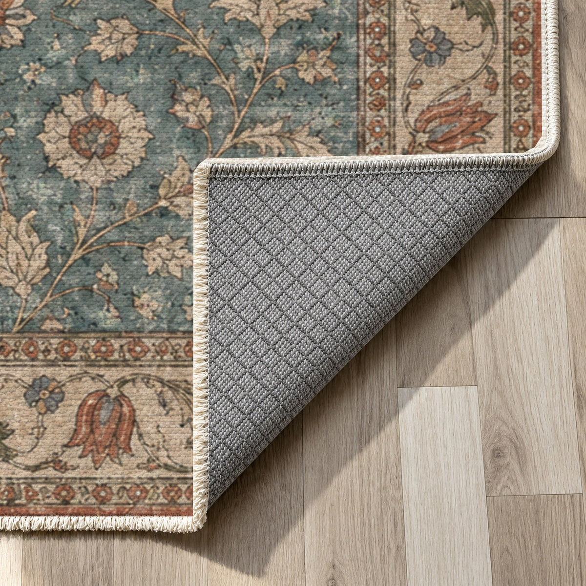 Faded Floral Turquoise Vintage Washable Rug — backing close up