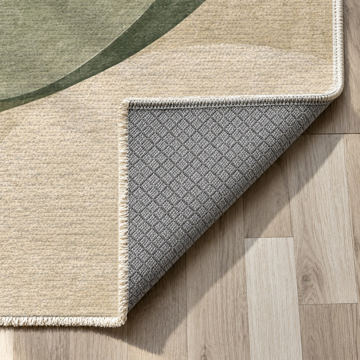 Family Circles Sage Abstract Washable Rug — backing close up