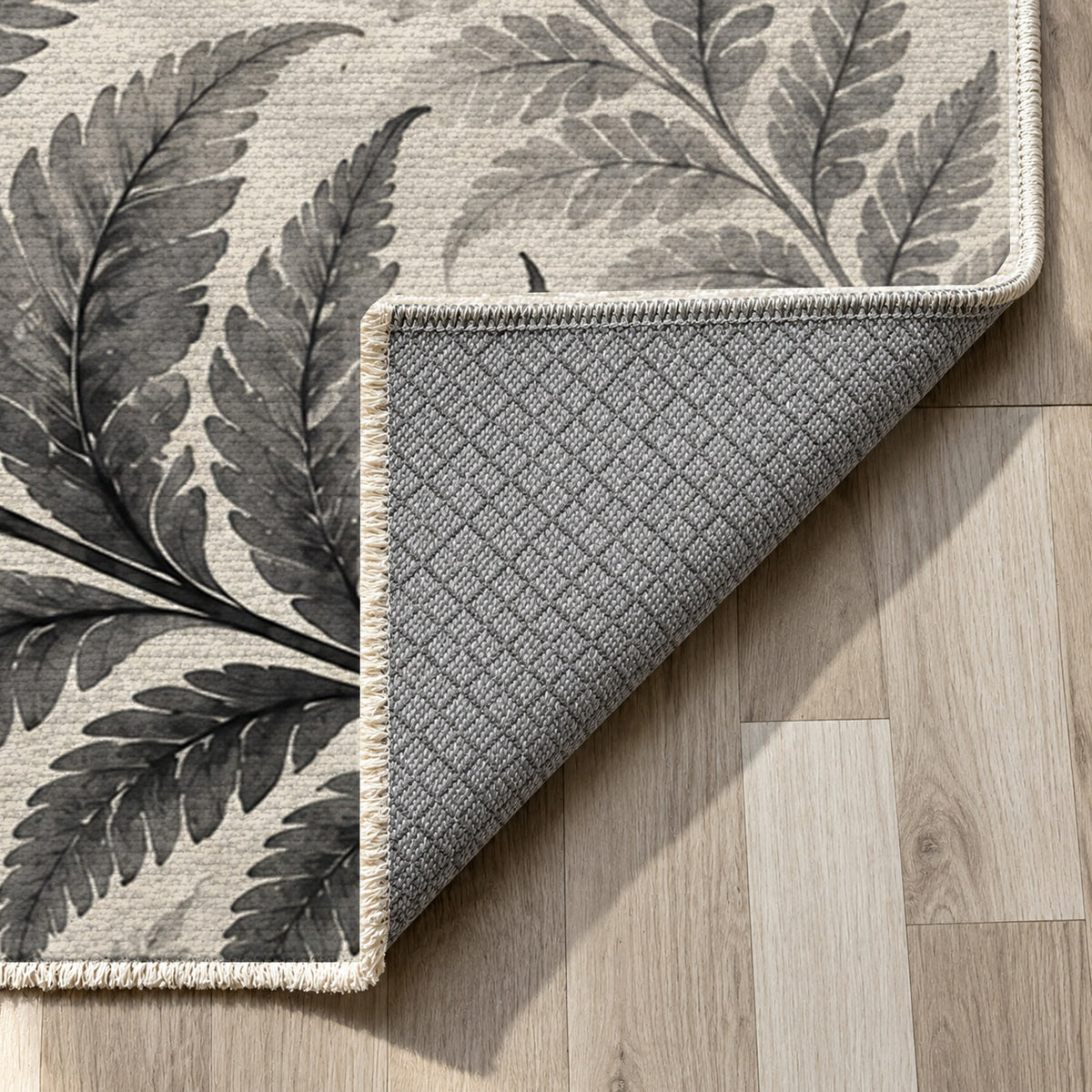 Fern Rhythm Charcoal Floral Washable Rug — backing close up
