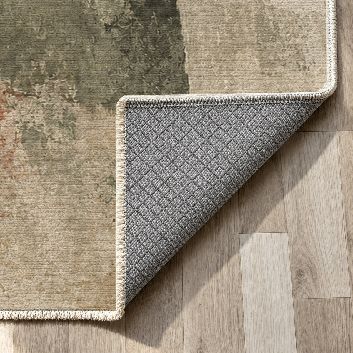 Fractured Light Sage Clay Abstract Washable Rug — backing close up