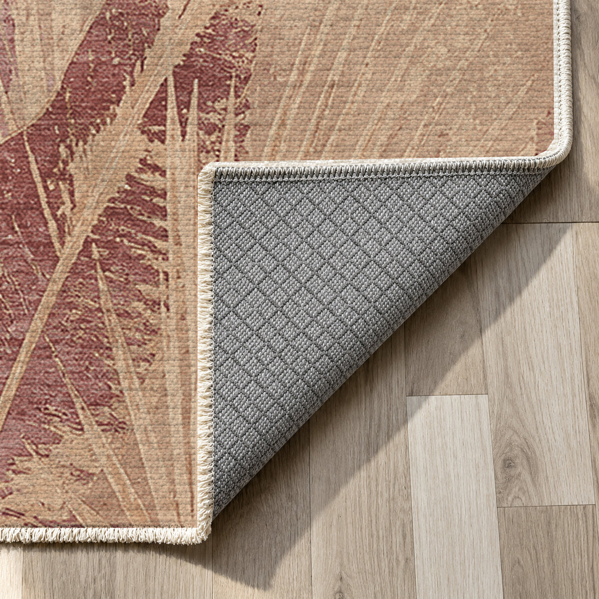 Frond Terracotta Abstract Washable Rug — backing close up