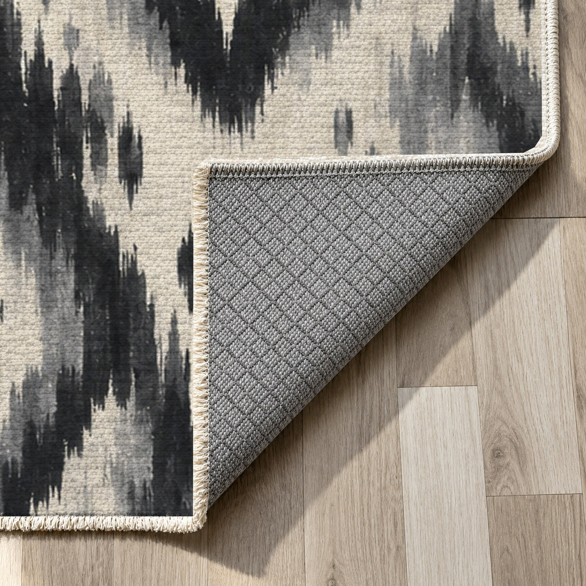 Indigo Ikat Charcoal Ethnic Washable Rug — backing close up