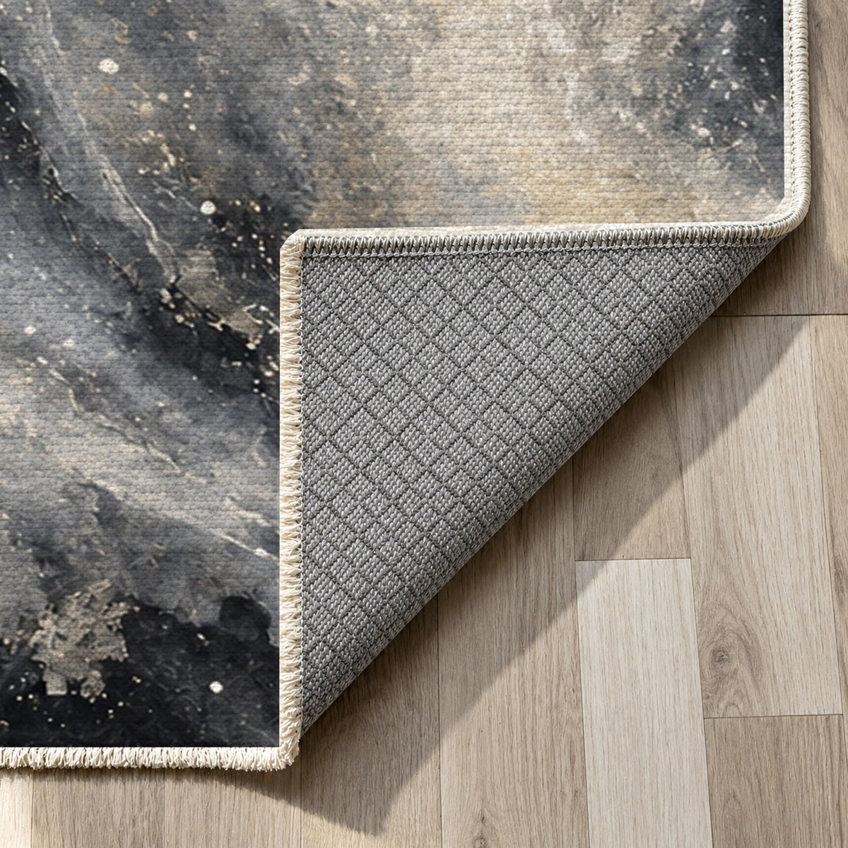 Milky Ribbons Charcoal Abstract Washable Rug — backing close up