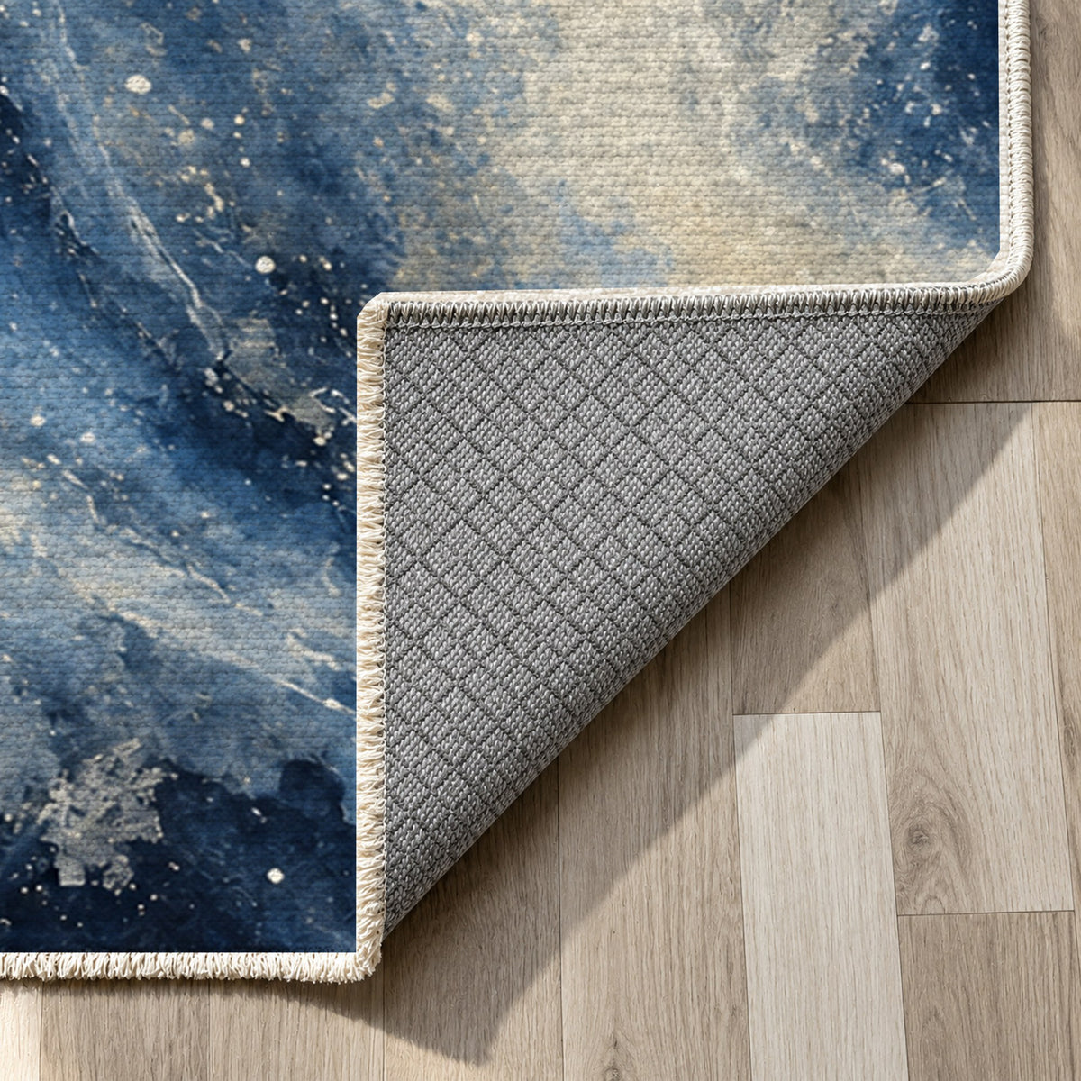 Milky Ribbons Indigo Abstract Washable Rug — backing close up