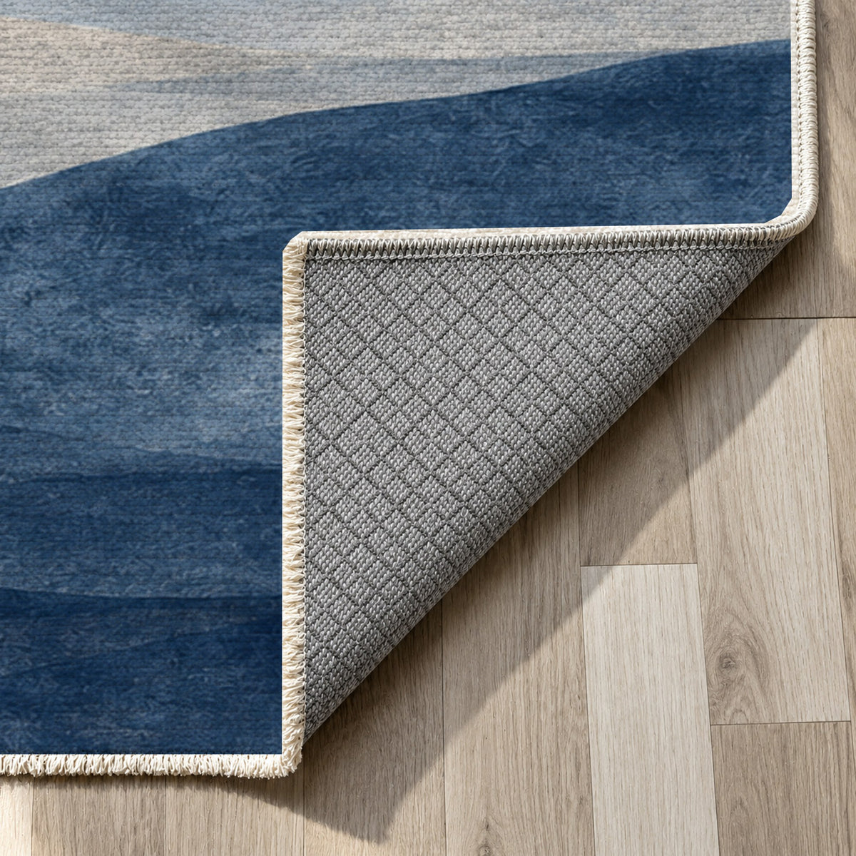 Mirage Layers Indigo Modern Washable Rug — backing close up