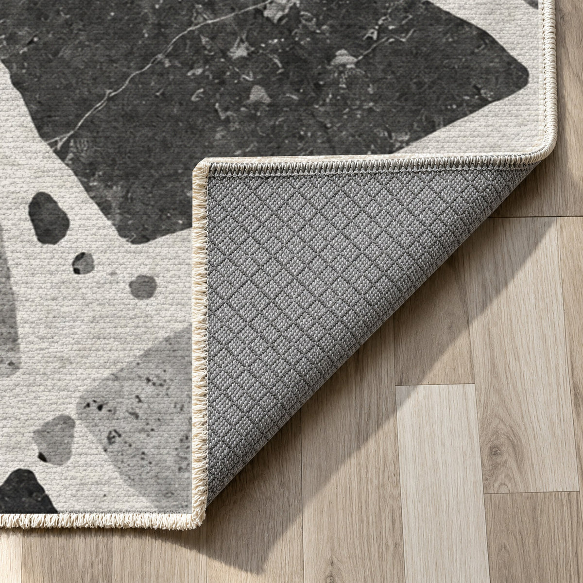 Modern Terrazzo Charcoal Ivory Washable Rug — backing close up