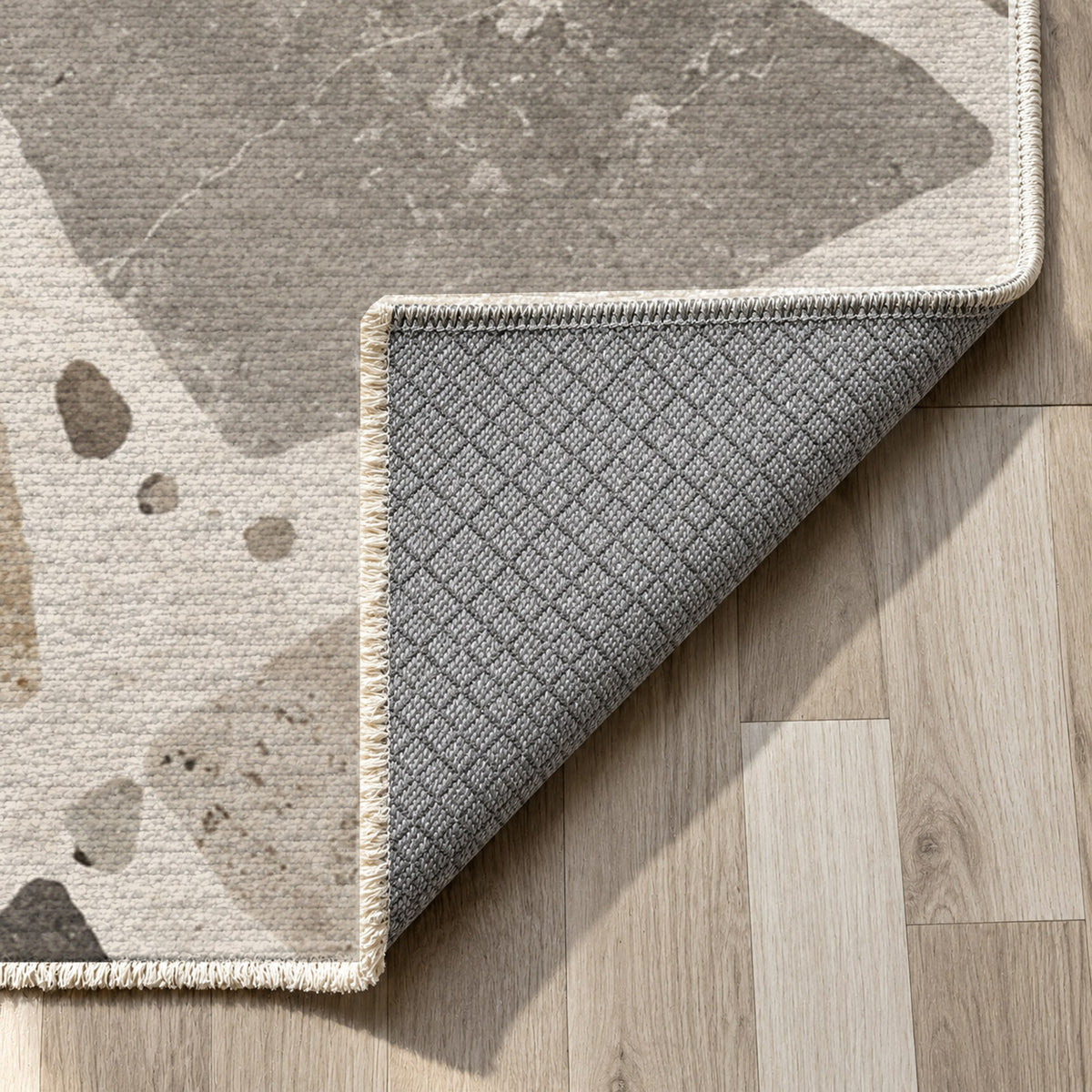 Modern Terrazzo Ivory Taupe Washable Rug — backing close up