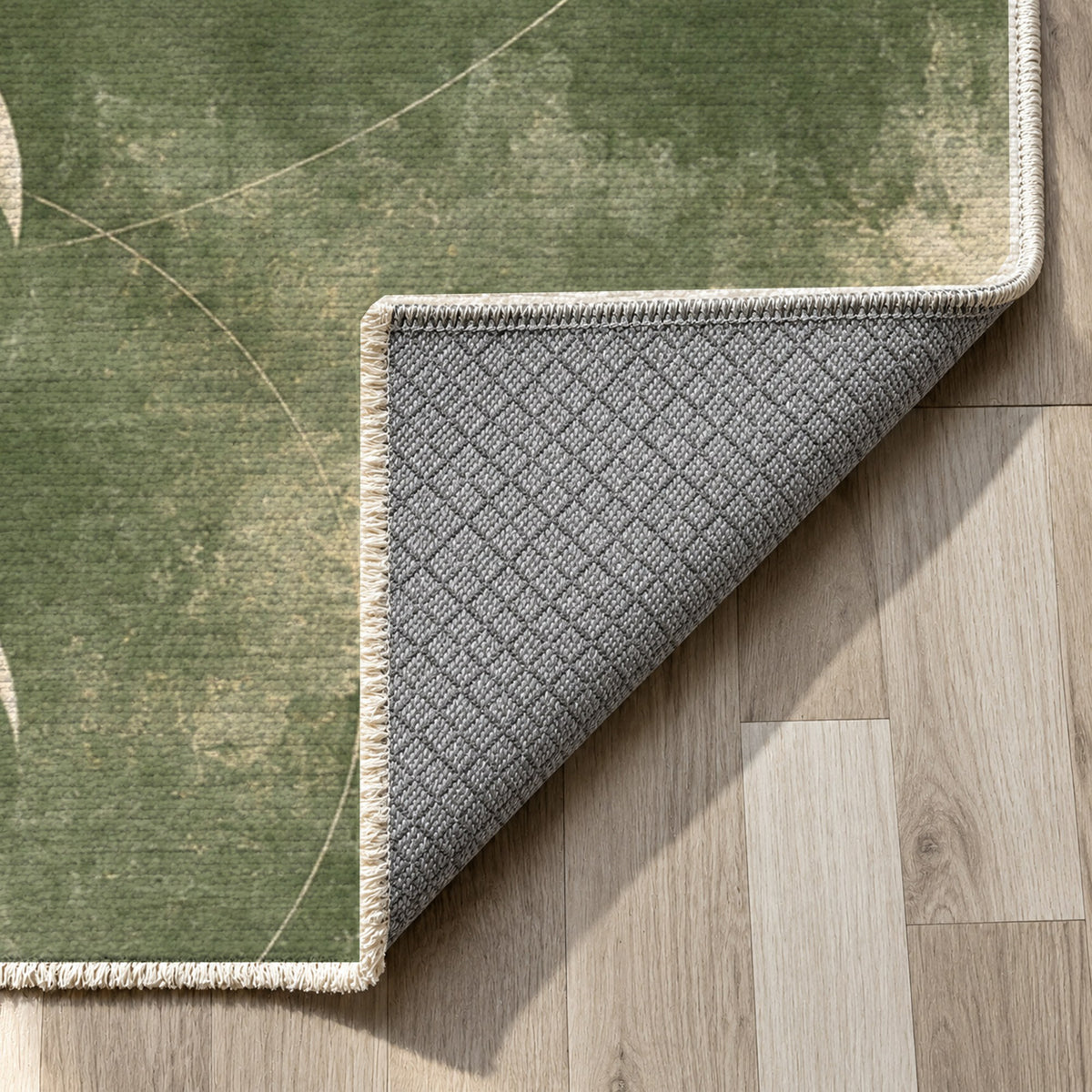 Moon Phases Sage Abstract Washable Rug — backing close up
