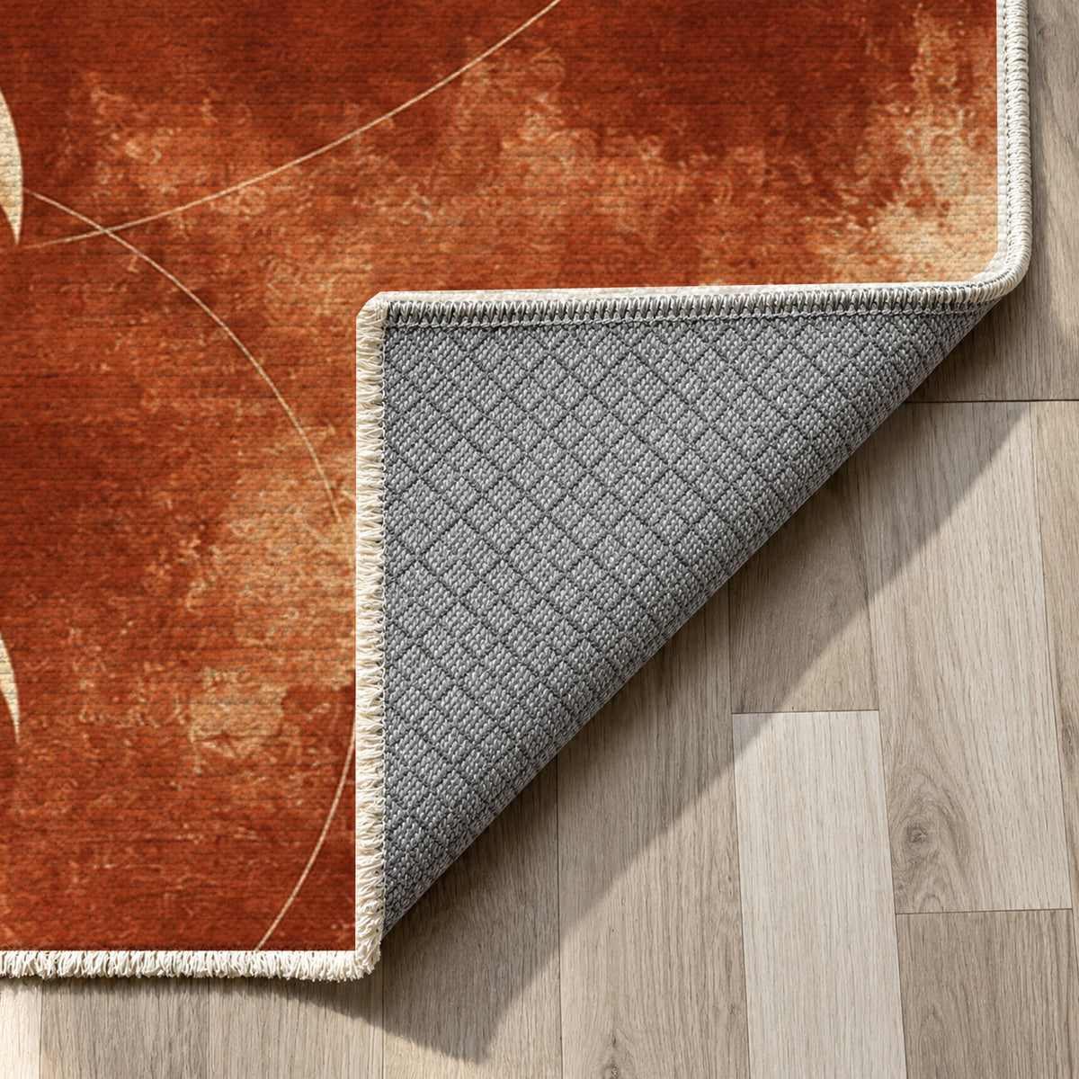 Moon Phases Terracotta Abstract Washable Rug — backing close up