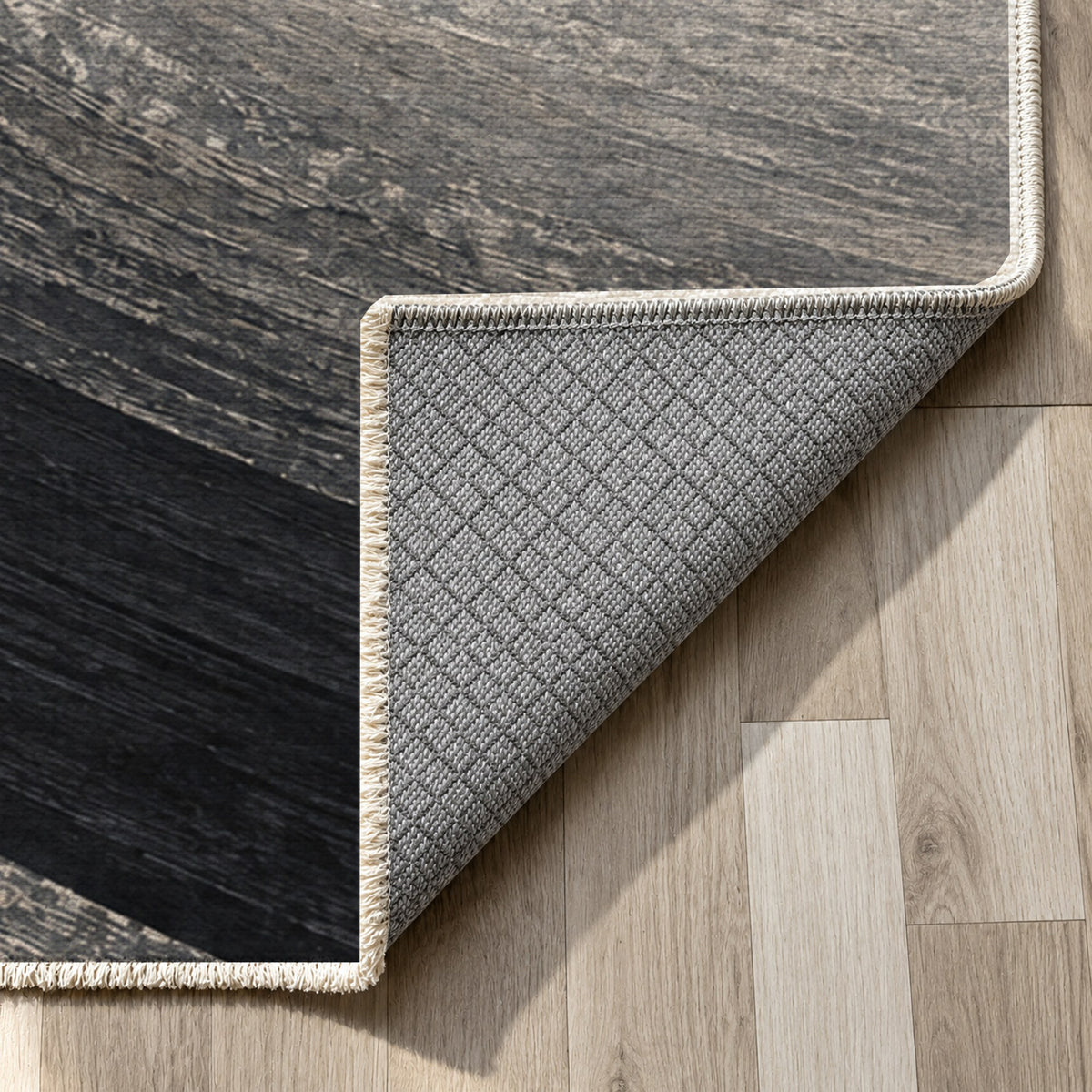 Moonlit Sands Charcoal Modern Washable Rug — backing close up