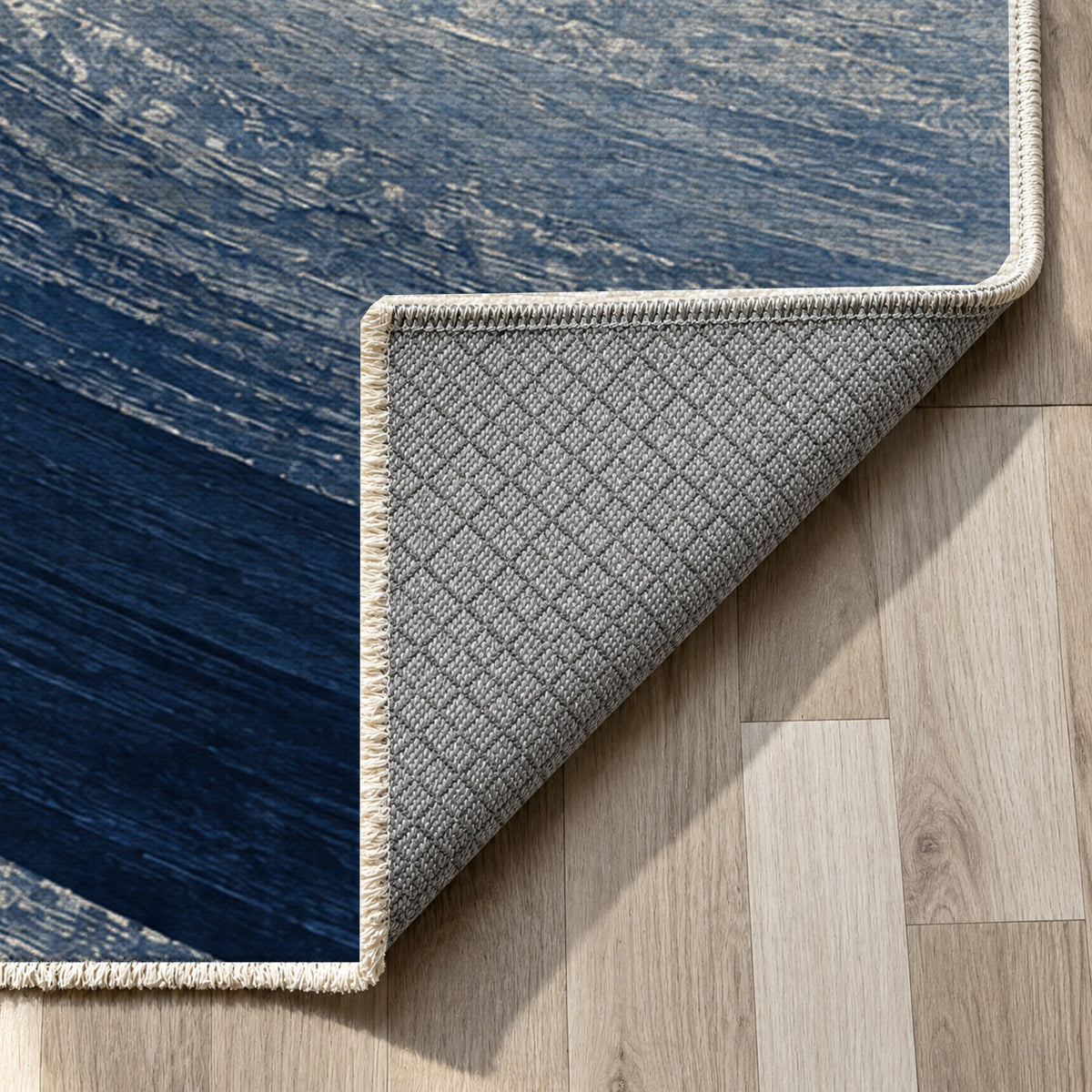 Moonlit Sands Indigo Modern Washable Rug — backing close up