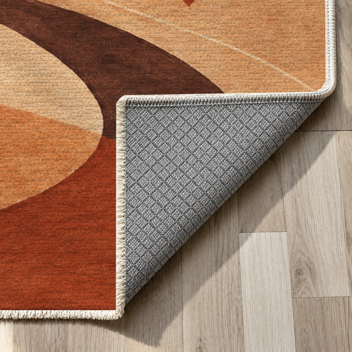 Nomad Paths Terracotta Modern Washable Rug — backing close up
