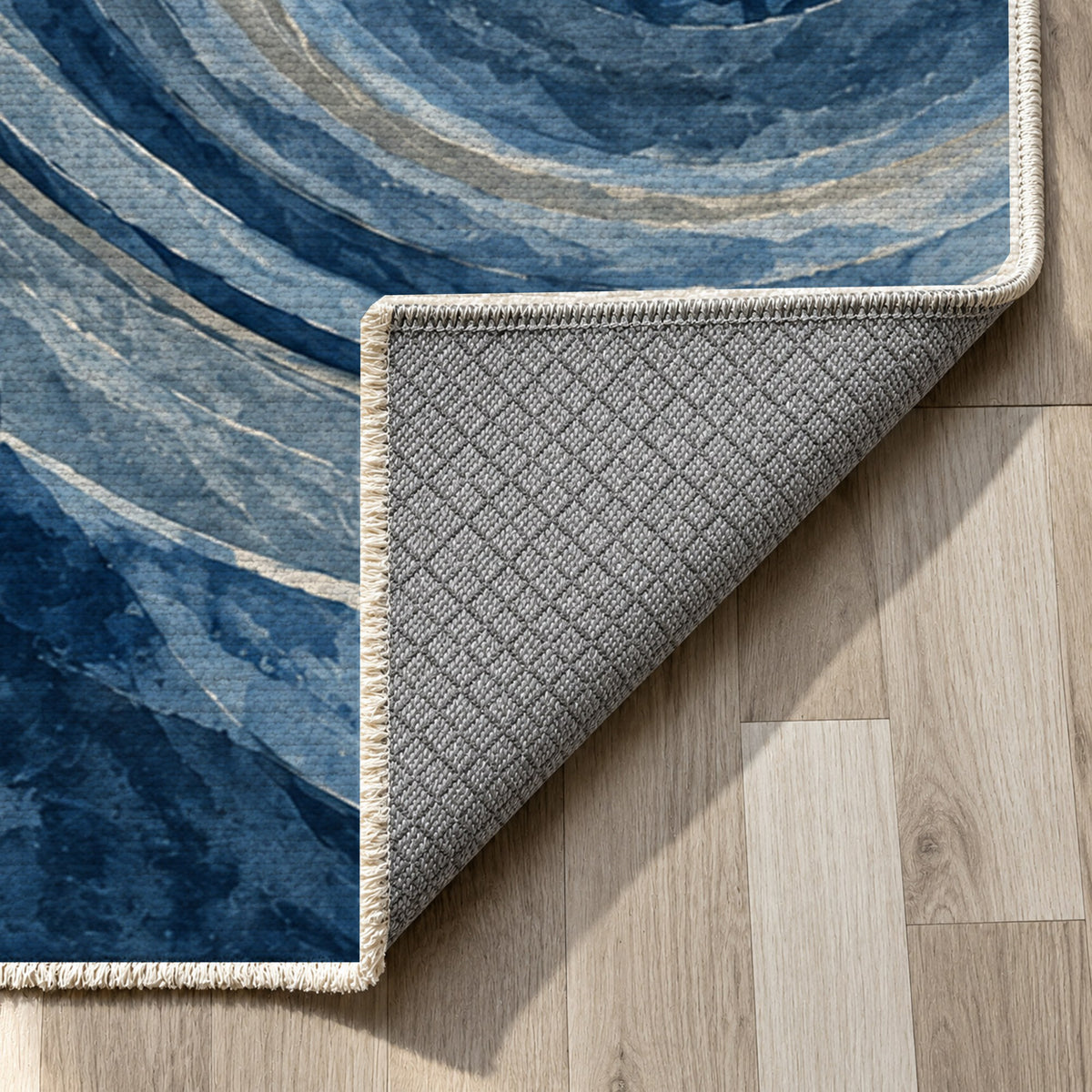 Ocean Rings Indigo Abstract Washable Rug — backing close up