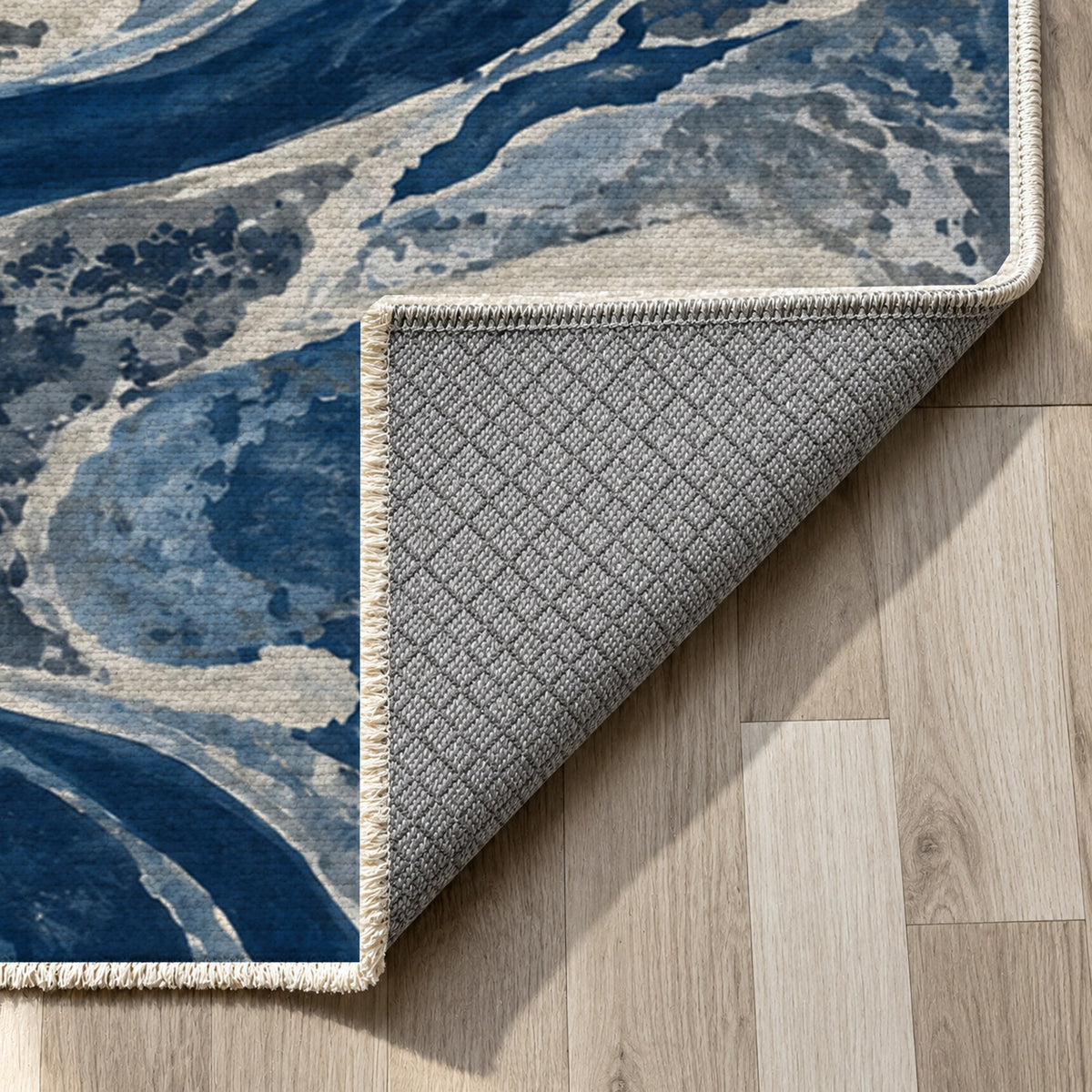 Ox Bow Lakes Indigo Abstract Washable Rug — backing close up