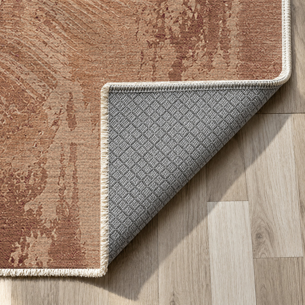 Pampas Terracotta Abstract Washable Rug — backing close up