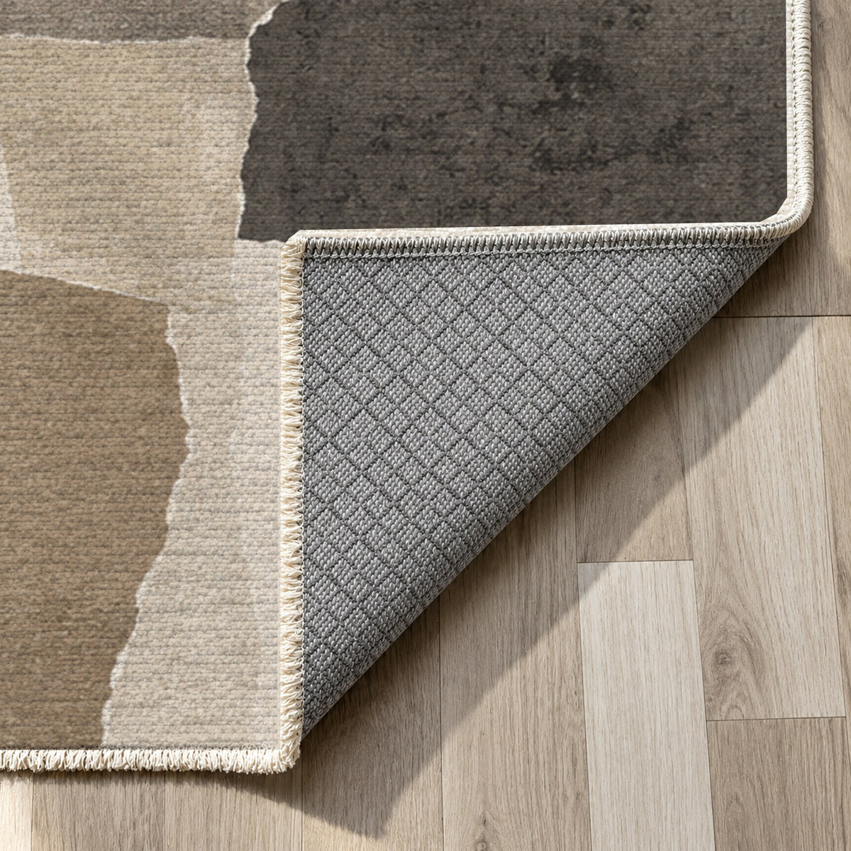 Paper Collage Ivory Taupe Modern Washable Rug — backing close up