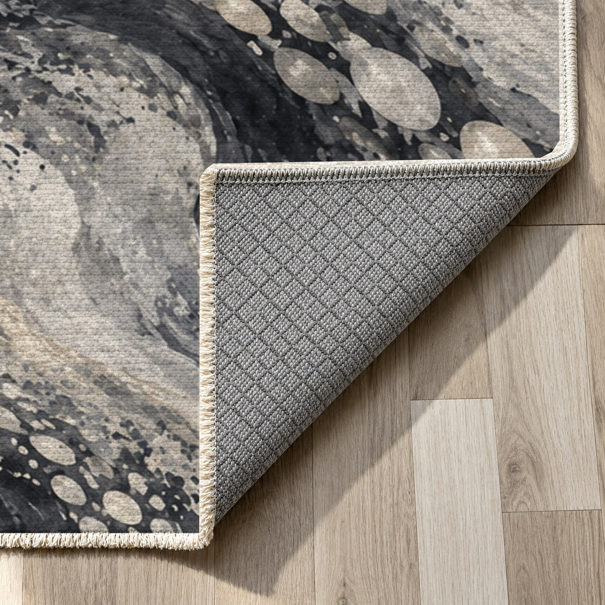 Pearl Shoals Charcoal Abstract Washable Rug — backing close up