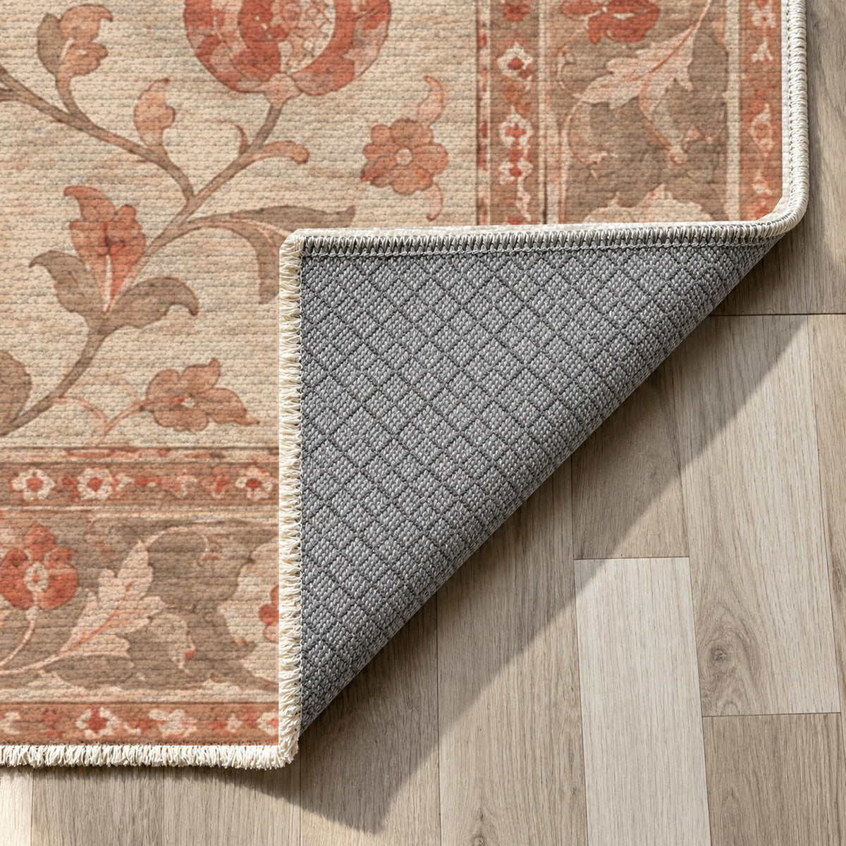 Pomegranate Trails Coral Sand Classic Washable Rug — backing close up