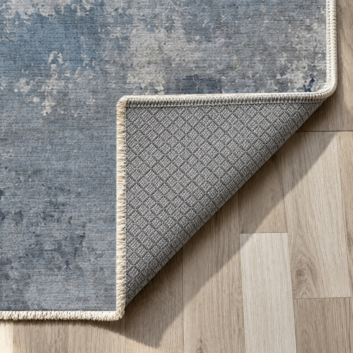 Quiet Horizon Blue Grey Abstract Washable Rug — backing close up