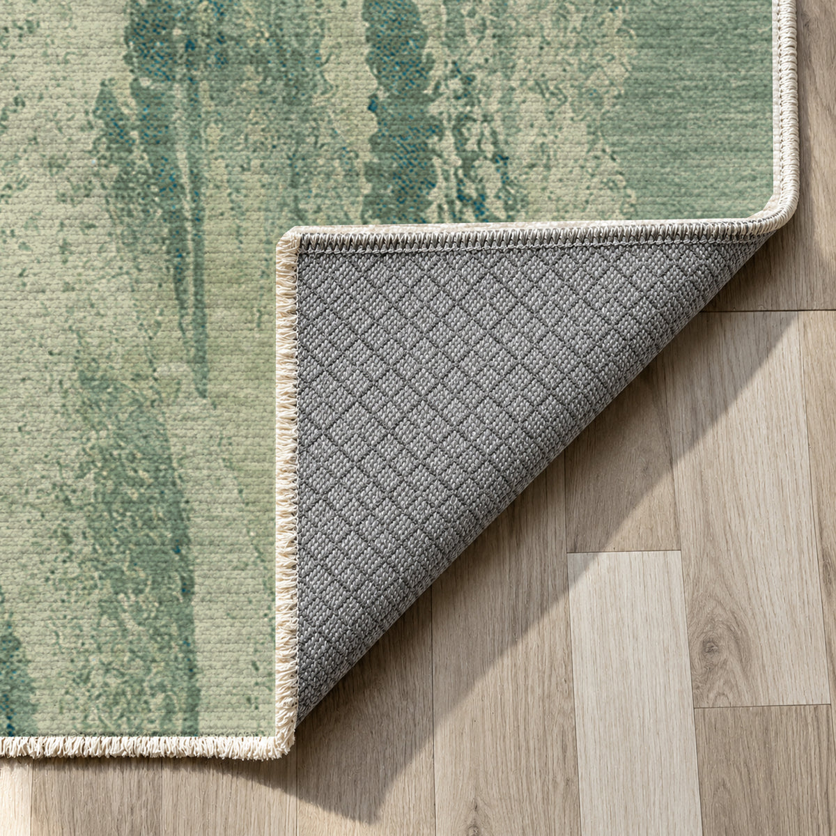 Reed Aqua Abstract Washable Rug — backing close up
