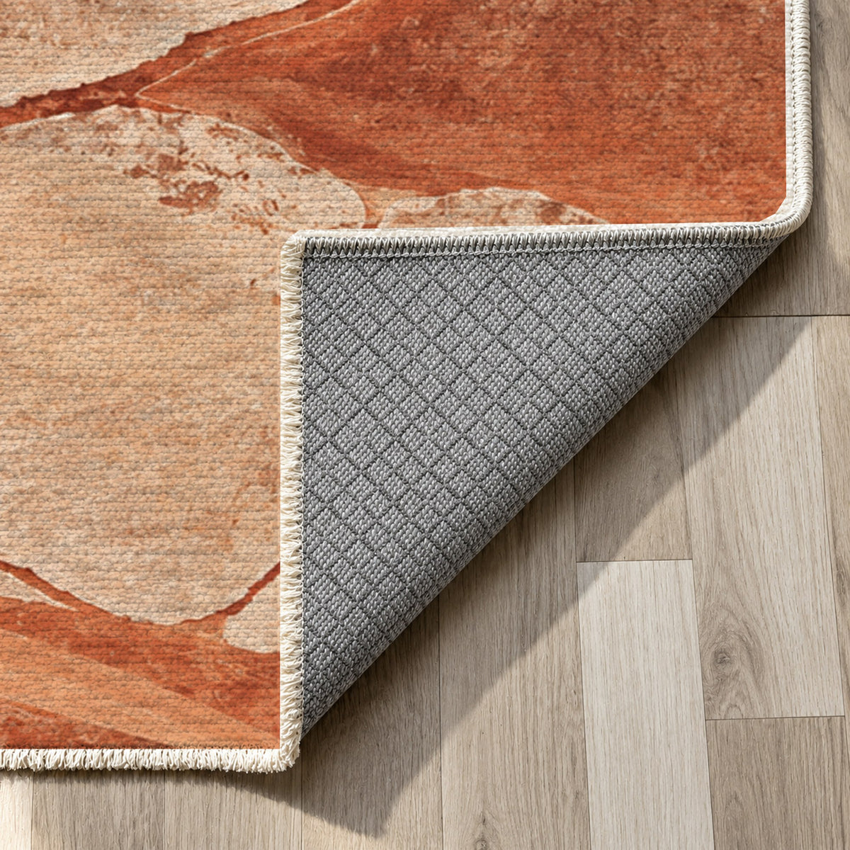 Salt Flats Terracotta Modern Washable Rug — backing close up