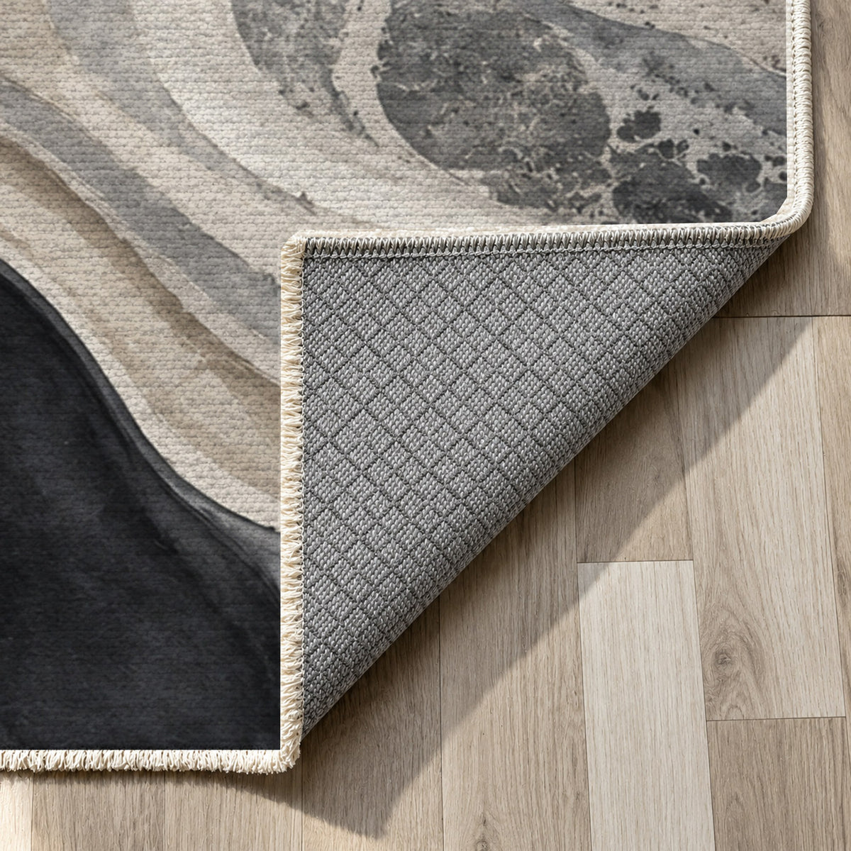 Sandbar Ribbons Charcoal Abstract Washable Rug — backing close up