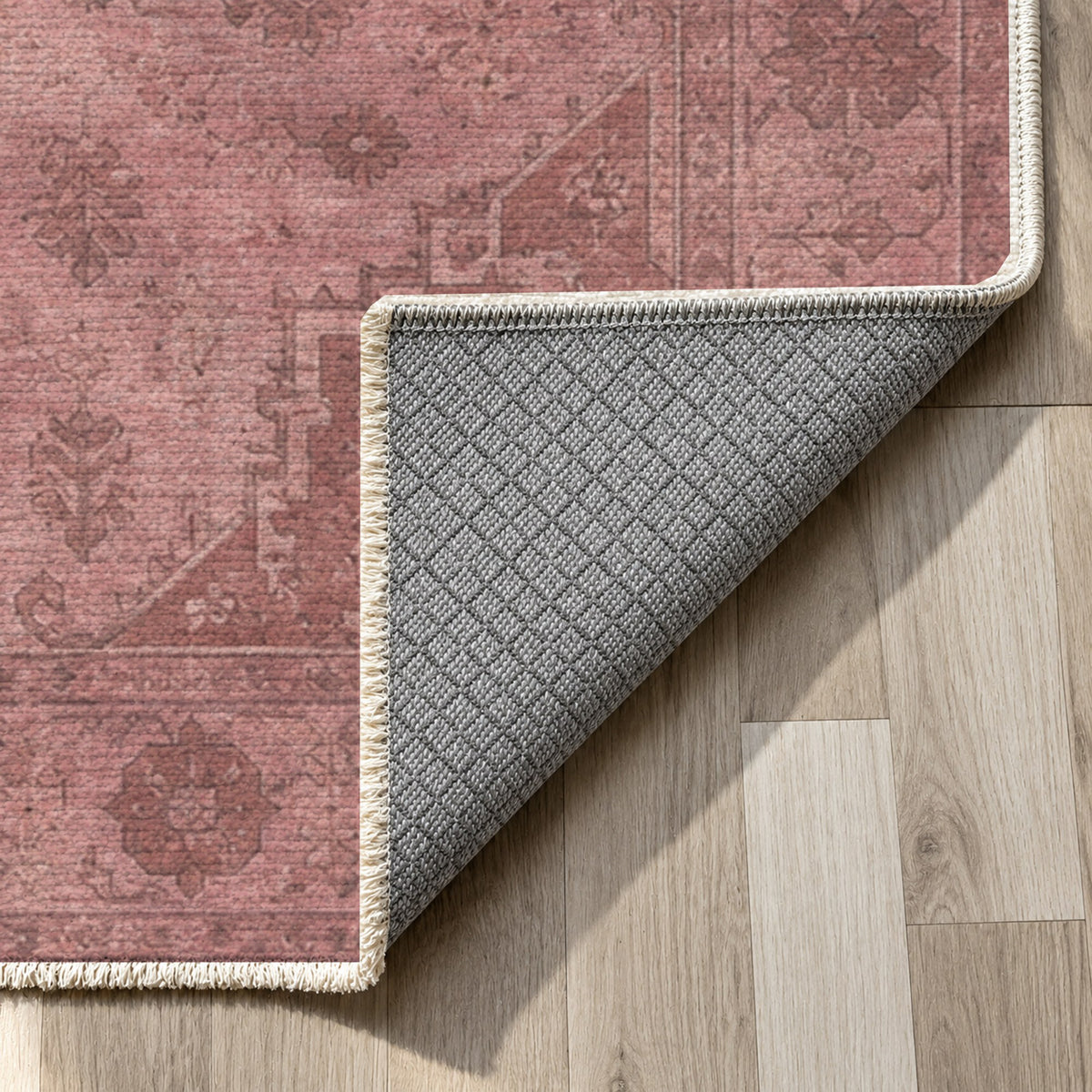 Serapi Patina Rose Pink Vintage Washable Rug — backing close up