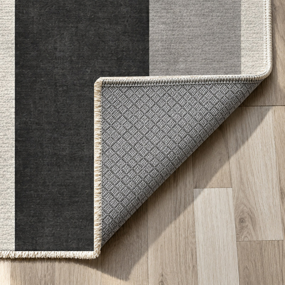 Soft Arches Charcoal Ivory Modern Washable Rug — backing close up