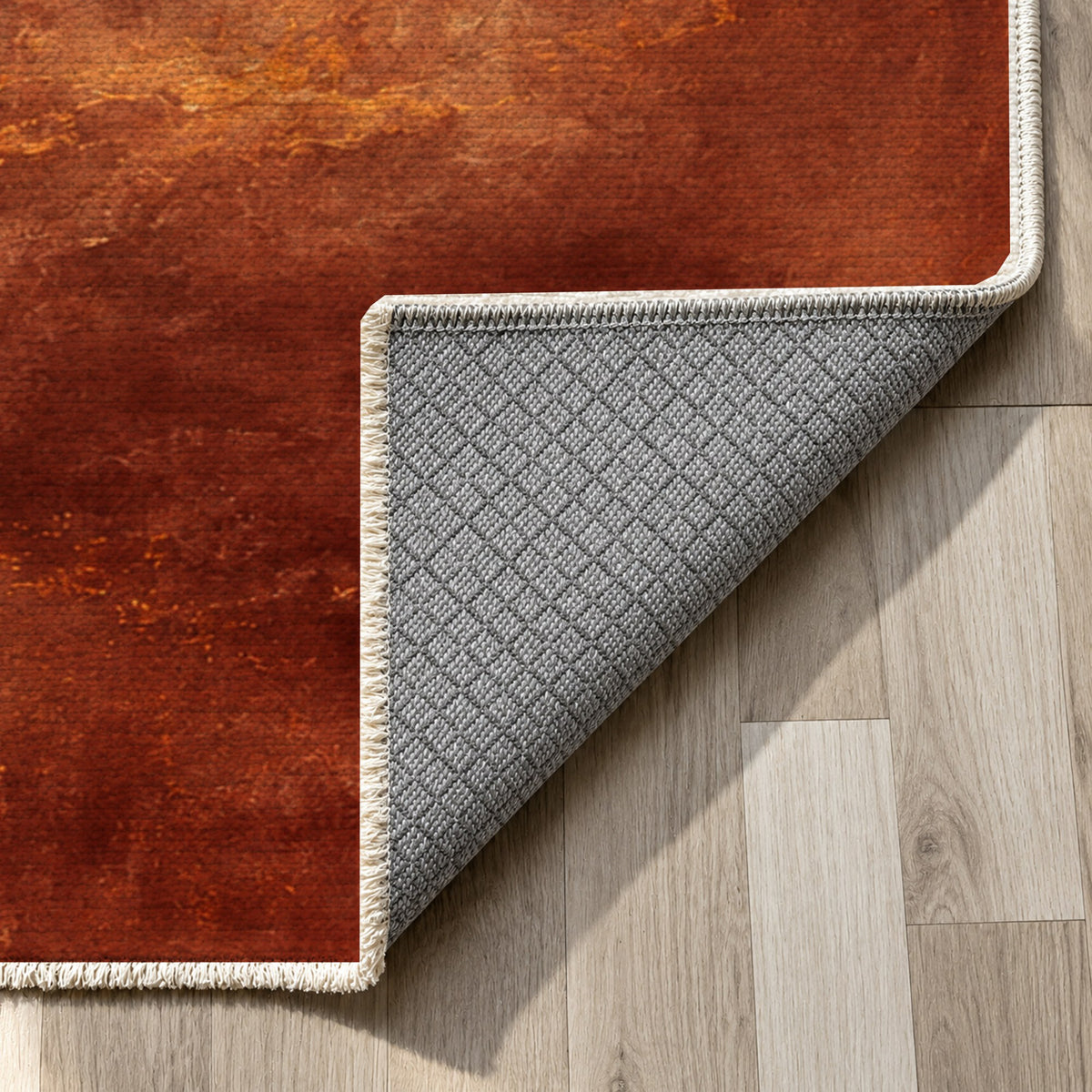 Solar Halo Terracotta Abstract Washable Rug — backing close up