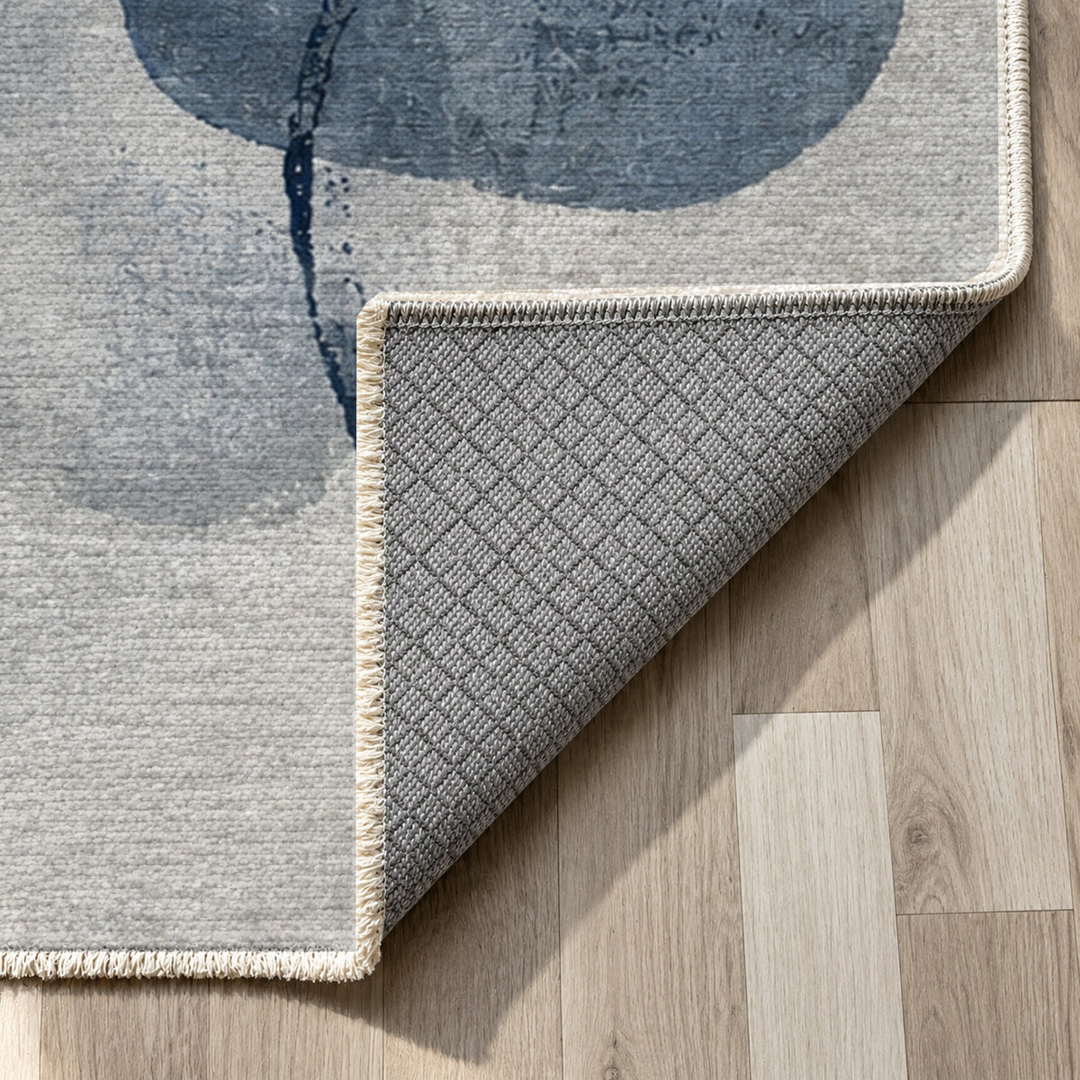 Stone Dialogue Blue Grey Abstract Washable Rug — backing close up