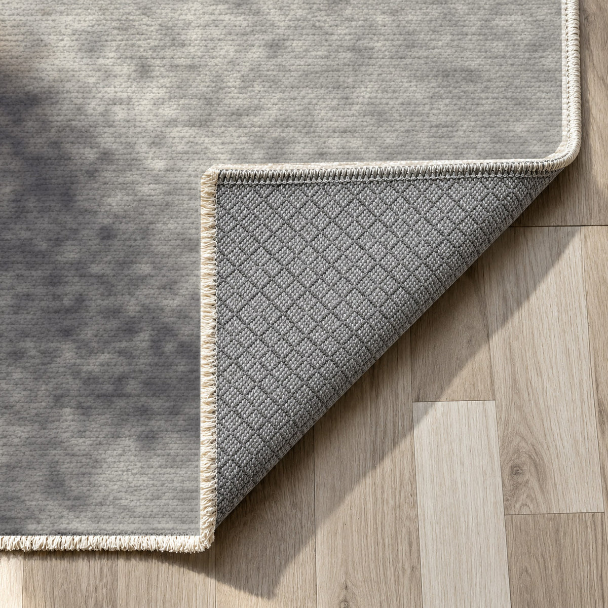 Strata Black Abstract Washable Rug — backing close up