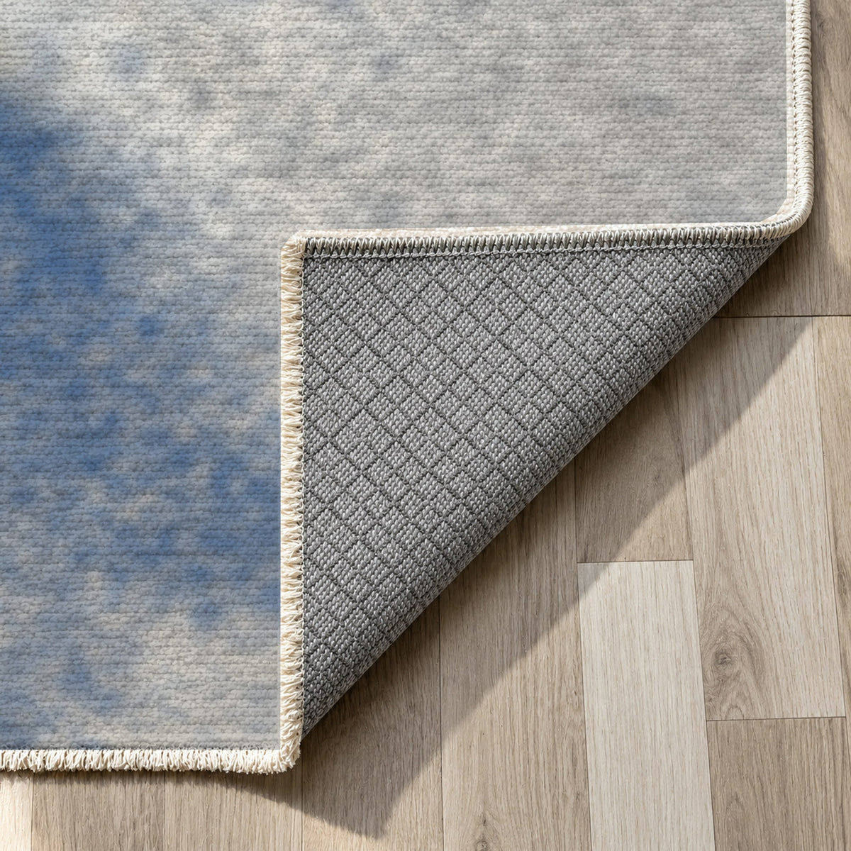 Strata Navy Abstract Washable Rug — backing close up