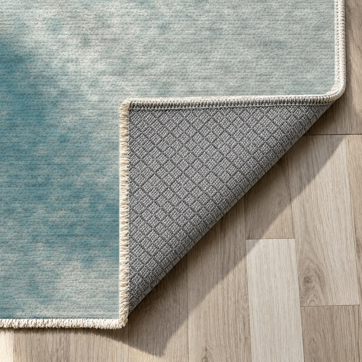 Strata Teal Abstract Washable Rug — backing close up