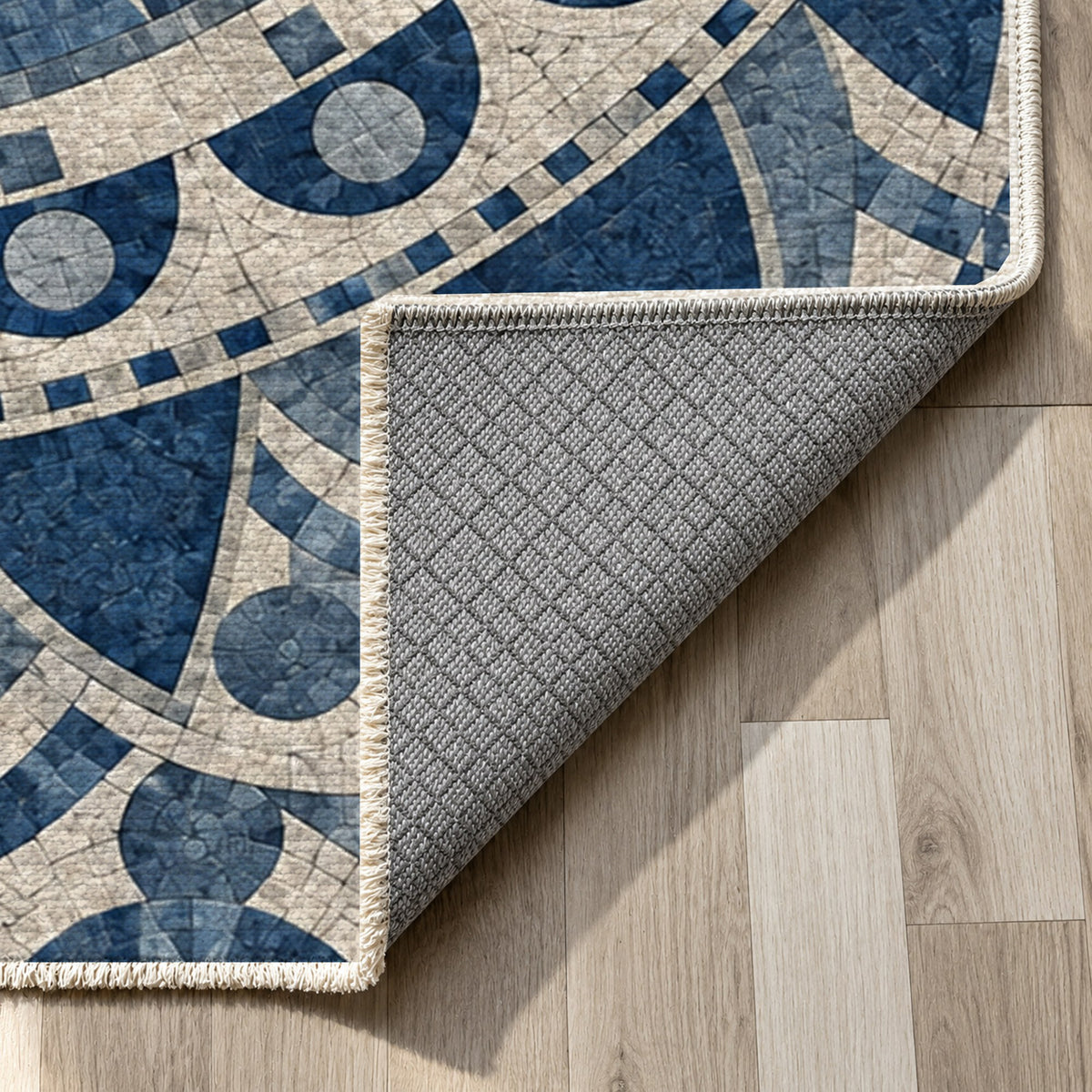 Sun Wheel Indigo Geometric Washable Rug — backing close up