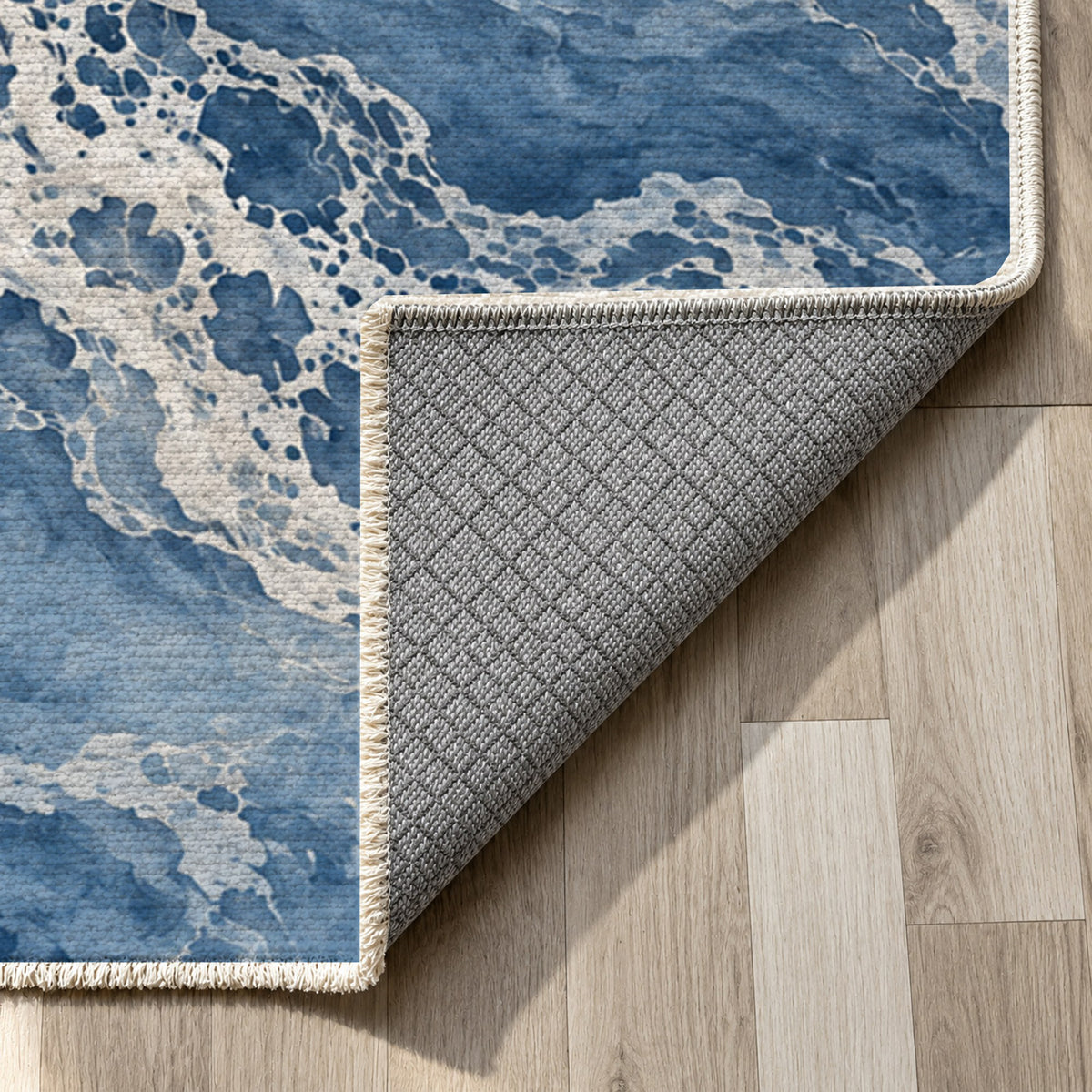 Tidal Lace Indigo Abstract Washable Rug — backing close up