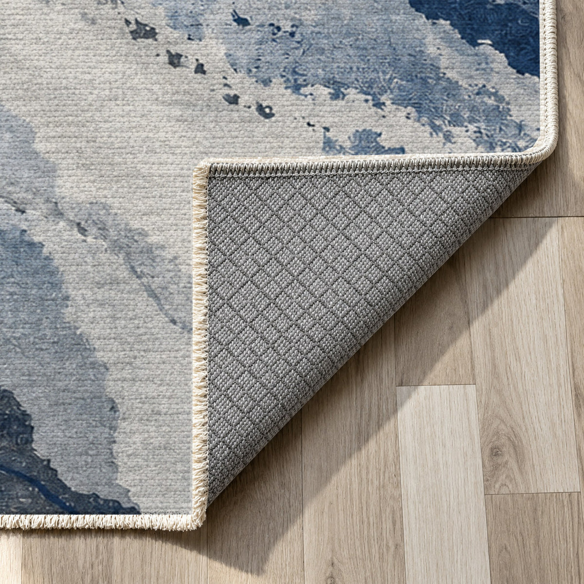 Tidal Traces Blue Grey Abstract Washable Rug — backing close up