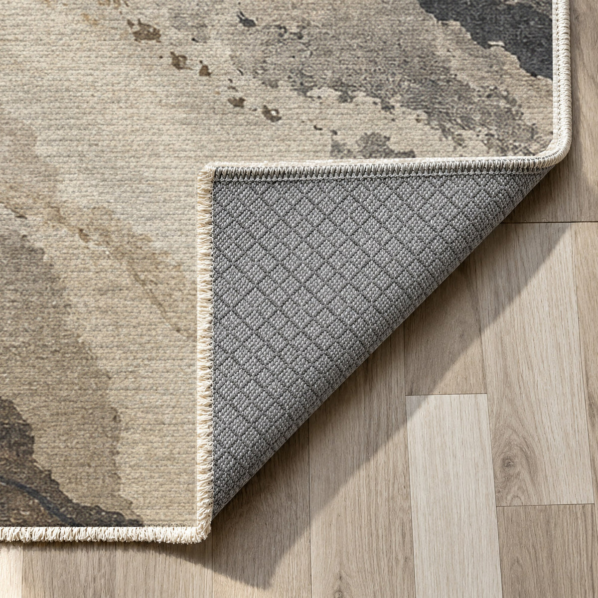 Tidal Traces Ivory Taupe Abstract Washable Rug — backing close up